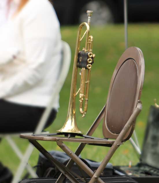 Jim’s trumpet rests on an empty chair in his memory.