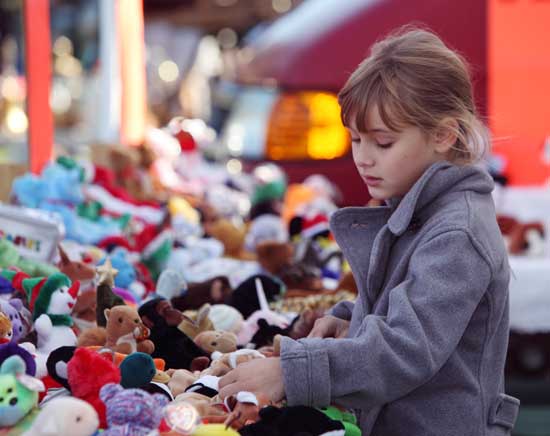 Sarah Sobalvarro takes her time picking out just the right Beanie Baby at the Columbus Day Weekend Flea Market on Oct. 9.