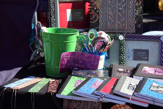 Colorful notebooks and bookmarks wait for customers.