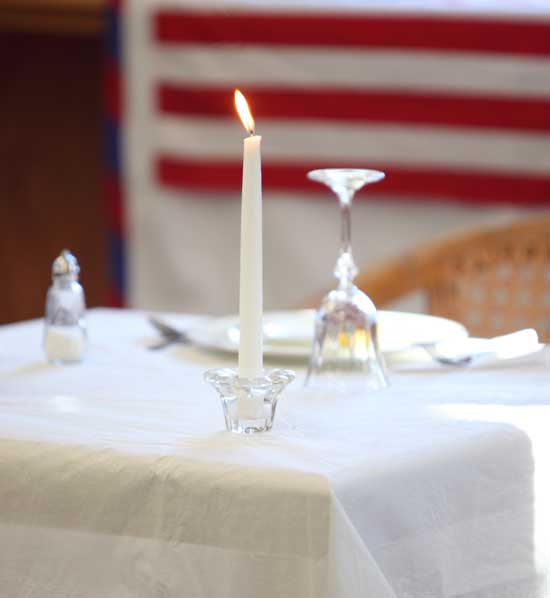 An empty place setting serves as a symbol of the thousands of American prisoners of war and missing-in-action soldiers from all of the country’s foreign conflicts. 
