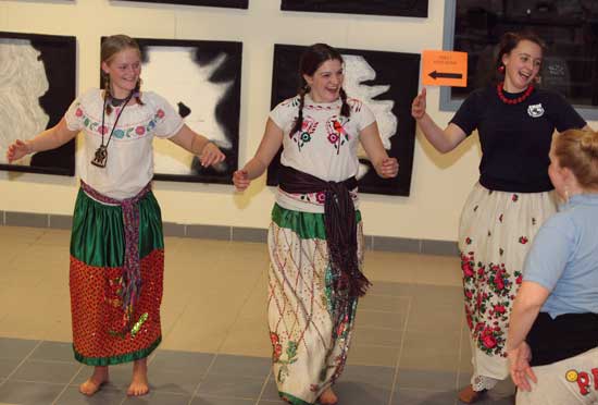 From left: Christah Porter, Hannah Porter, and Elizabeth Wilkey try out Salsa dancing