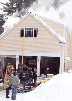 Chief Hurme (bottom left) responding to a house fire last month. (Photo by Lisa Aciukewicz) Chief Hurme (bottom left) responding to a house fire last month. (Photo by Lisa Aciukewicz)