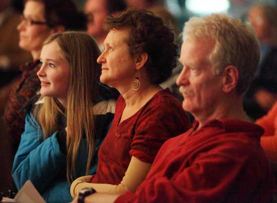From left: Nikki Chapman, Patty Ruze, and John Chapman are part of rapt audience.