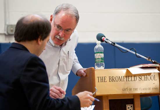 Town Moderator Bob Eubank consults with Town Counsel Mark Lanza.