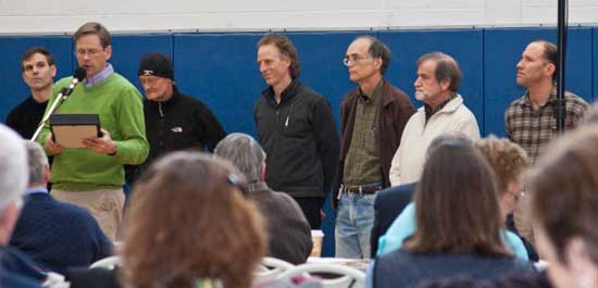 The Energy Advisory Committee (from left, Eric Broadbent, David Fay, Forrest Hodgkins, Bill Blackwell, Rene Roy, and Chairman Brian Smith) listens as Selectman Tim Clark names them the 2010 Committee of Note. (Photo by Tyler Papazian)