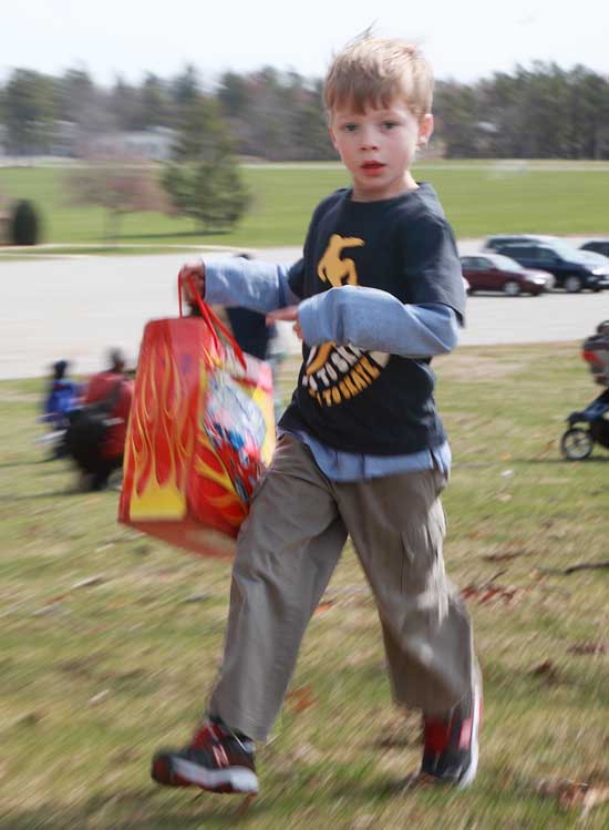 Jack Babcock takes off on a run at the Devens egg hunt on April 16.