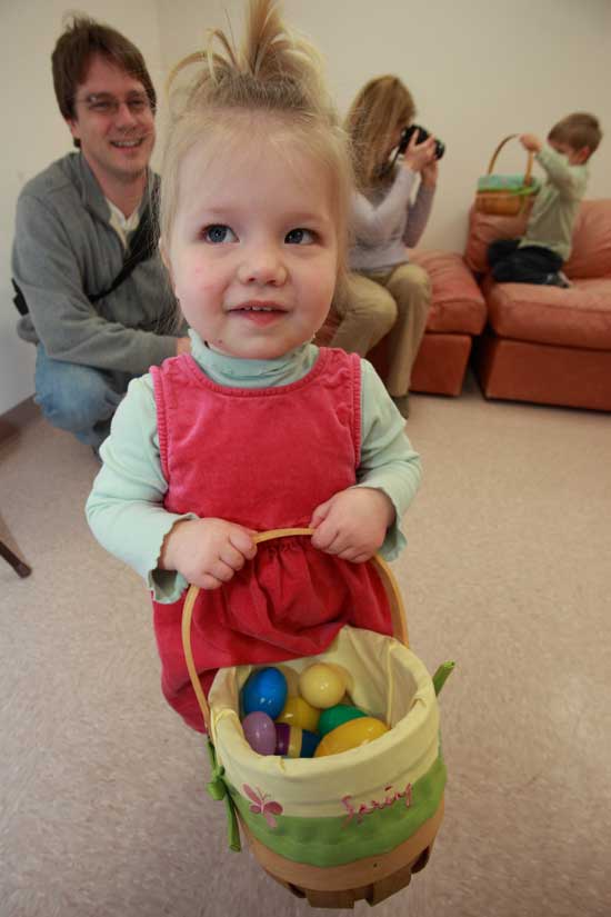 From left: Sam, Gwyn, Katy, and Russell Poutasse take part in the Harvard Family Association spring egg hunt held in the Congregational Church hall on a rainy April 23.