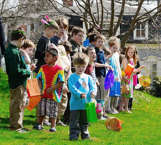 Children wait for the start of the Easter morning egg hunt at the Unitarian Universalist Church. (Photo by John Sharko)