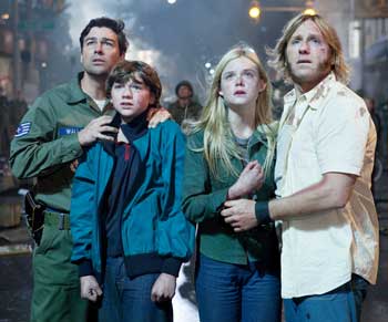 Left to right: Kyle Chandler, Joel Courtney, Elle Fanning, and Ron Eldard in Super 8. (Courtesy photo)
