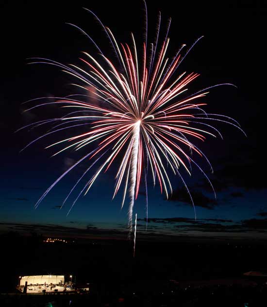 Fireworks light up the night sky beside the Fruitlands stage. (Photo by Lisa Aciukewicz)