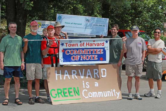 Members of the Energy Advisory Committee, Harvard's Committee of Note, are ready to march in the parade.  (Photo by Lisa Aciukewicz)