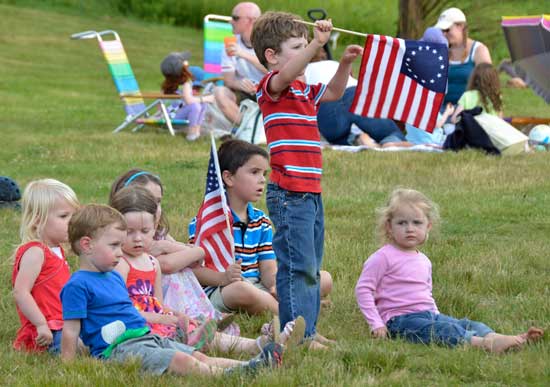 A group of children listens to the music.  (Photo by Katy Sharko)
