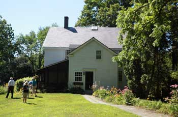 The Stroh’s house in Shaker Village was the first stop for participants in the Shaker Seminar Conference tour on July 30. (Photo by Lisa Aciukewicz)