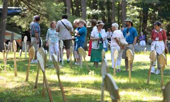 Tour participants check out the Shaker “lollipop” cemetery. (Photo by Lisa Aciukewicz)