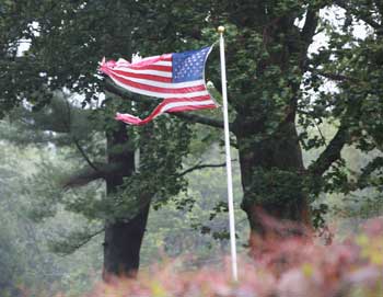 A flag gets battered by the wind during the storm. (Photo by Lisa Aciukewicz) 