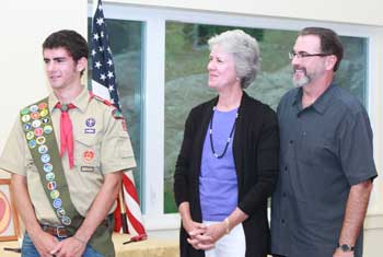 Proud parents Carol and Chris Landry look on as son Jack is named an Eagle Scout. (Photo by Lisa Aciukewicz) Proud parents Carol and Chris Landry look on as son Jack is named an Eagle Scout. (Photo by Lisa Aciukewicz)