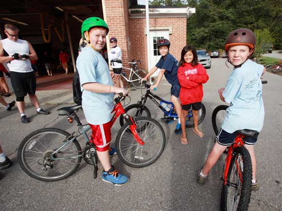 Left to right: Ethan Burke, Patrick Keiran, Sadie Keiran, and Chris Harrod wait for the ride to begin. 
