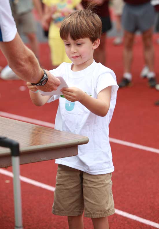 Five-year-old Will Salter, visitng Harvard from Providence, was the youngest runner to complete the course and stay for the award ceremony.