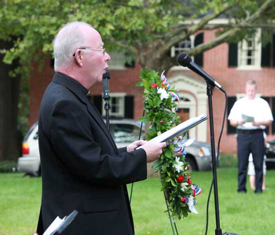 Father Terence Kilcoyne of Holy Trinity Parish leads a responsive reading.