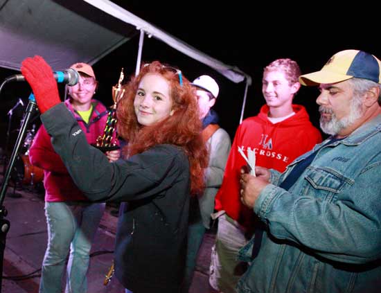 Second place winners, “The Cranks” accept their trophies. From left: Becky Gordon (Lions Club Member), Haley Gowland, Connor Gowland, Greg Preston, and John Drummey (Lions Club Member). 
