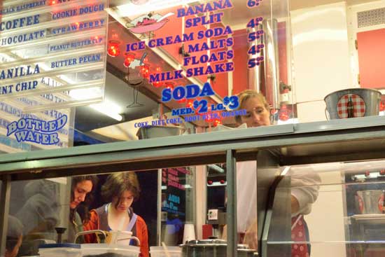 Annie Cooper and Jane Sullebarger (bottom left) order an ice cream. (Photo by Katy Sharko)