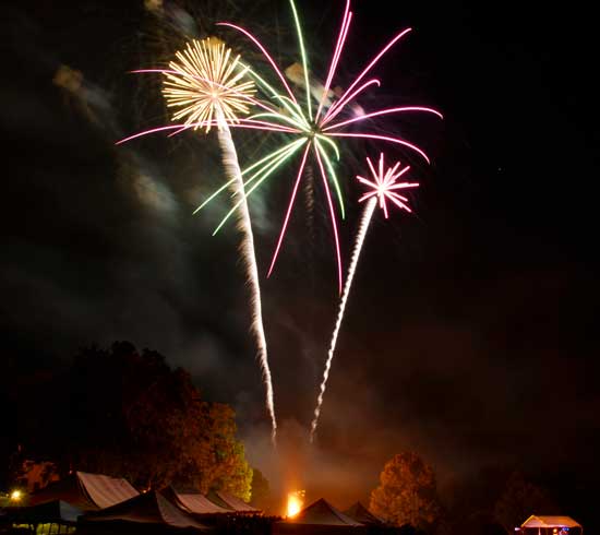 Fireworks explode above the food tents. (Photo by Katy Sharko)