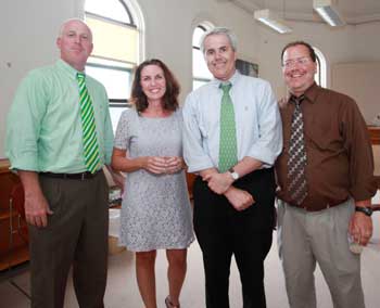 From left: Jim O’Shea, Cindy Hurley, Chris Jones, and Scott Hoffman pose at Cindy’s going away party, Sept. 15. (Photo by Lisa Aciukewicz) From left: Jim O’Shea, Cindy Hurley, Chris Jones, and Scott Hoffman pose at Cindy’s going away party, Sept. 15. (Photo by Lisa Aciukewicz)