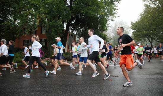 Runners turn off of Elm Street as the race commences from the common. 