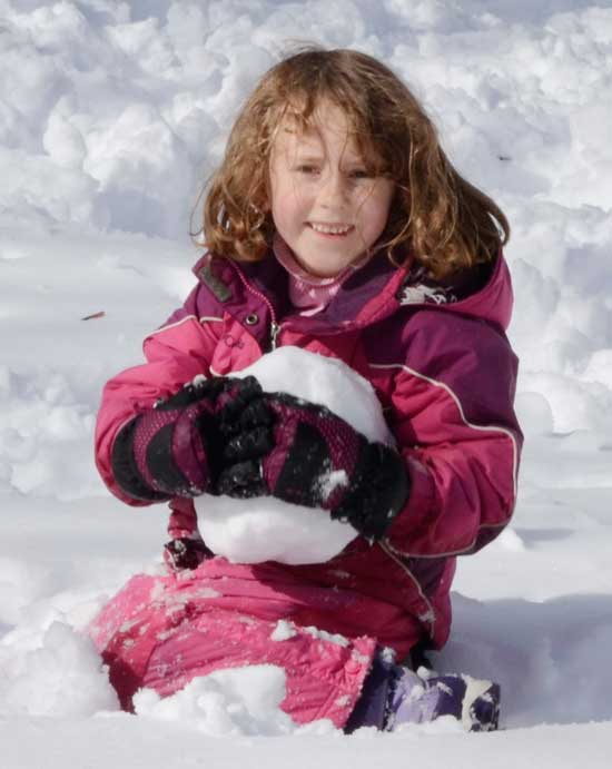 In a scene reminiscent of January, Ella Richards plays in the snow on the Common on Oct. 30. (Photo by John Sharko) In a scene reminiscent of January, Ella Richards plays in the snow on the Common on Oct. 30. (Photo by John Sharko)