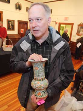 Jack Whelan holds a Ming Dynasty vase that he bought on eBay for $35. (Photo by Lisa Aciukewicz) Jack Whelan holds a Ming Dynasty vase that he bought on eBay for $35. (Photo by Lisa Aciukewicz)