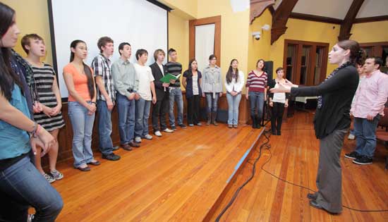 The Bromfield Chorus sings the national anthem under the direction of Talia Mercadante. The Bromfield Chorus sings the national anthem under the direction of Talia Mercadante.