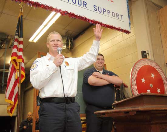 Chief Rick Sicard jokes with the crowd, “OK, this is the last call, who does not have power?” Chief Rick Sicard jokes with the crowd, “OK, this is the last call, who does not have power?”