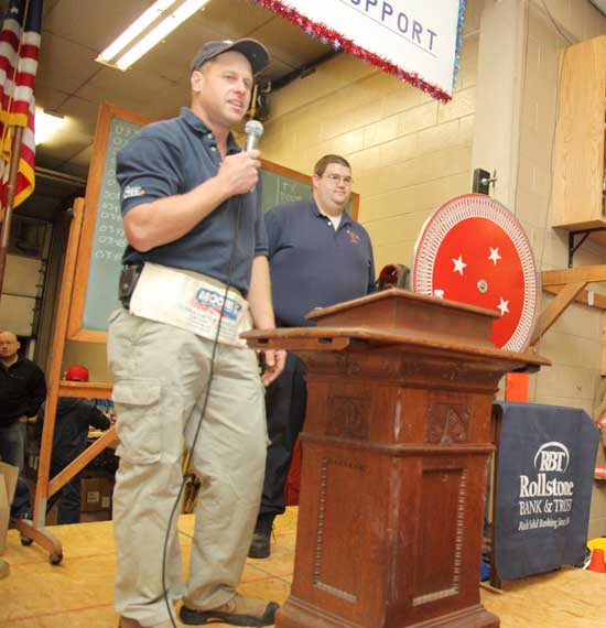 At the annual Firefighers' Turkey Raffle on Nov. 11 Greg Harrod dedicates a set of new trophy cases to the fire station in honor of his father Ken Harrod, a 45-year veteran of the fire department who passed away in 2010. At the annual Firefighers' Turkey Raffle on Nov. 11 Greg Harrod dedicates a set of new trophy cases to the fire station in honor of his father Ken Harrod, a 45-year veteran of the fire department who passed away in 2010.