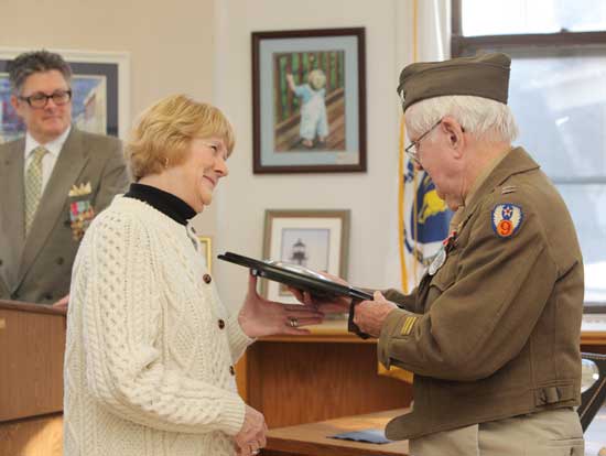 Doris Johnston presents James Dunlap Jr. with the PJ Johnston award for Veteran of the Year, which he shares with Hans Ohlin. Doris Johnston presents James Dunlap Jr. with the PJ Johnston award for Veteran of the Year, which he shares with Hans Ohlin.