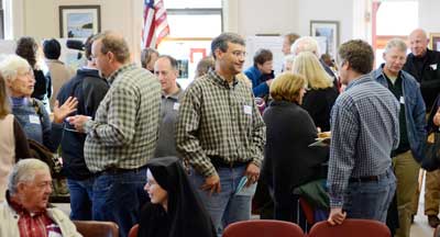Town residents talk during a break in the workshop. (Photo by John Sharko) Town residents talk during a break in the workshop. (Photo by John Sharko)