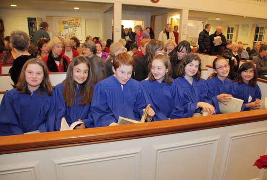 The junior choir takes a break after rehearsing. From left: Jenny Lord, Sophia Naroian, Jamie Aciukewicz, Gwyneth Evans, Maddy Hill, Tori Plaskon, and Emily Douglas.
