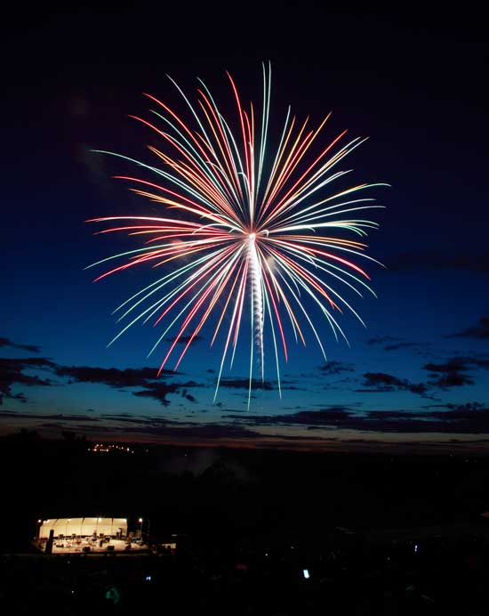 A skyrocket explodes over Fruitlands to celebrate July 4. 