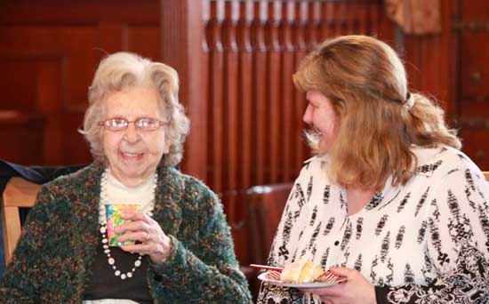 Phyllis Newman (left) sits with Ginger Quarles at Ginger’s going away party as she departed her position as Council on Aging Director in April.