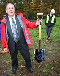 Town Administrator Tim Bragan holds a shovel used in the groundbreaking ceremony for the treatment plant in October. (File photo)