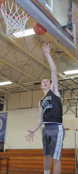 Sophomore forward Ryan Kennedy goes up for a layup. (Photo by Lisa Aciukewicz) Sophomore forward Ryan Kennedy goes up for a layup. (Photo by Lisa Aciukewicz)