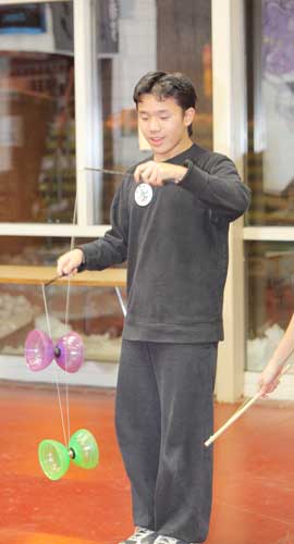 Nicolas Bibbo (left) and David Young demonstrate their skill at Chinese yo-yo.
