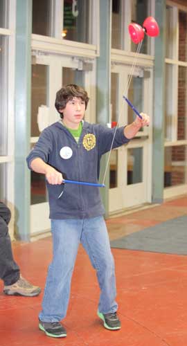 Nicolas Bibbo (left) and David Young demonstrate their skill at Chinese yo-yo.