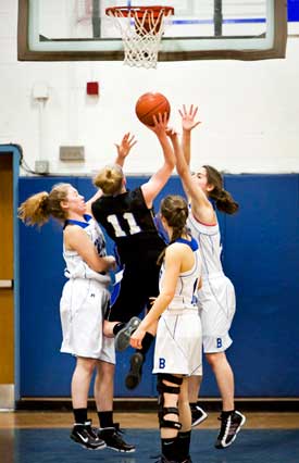 From left: Kate Drummey, Casey Magrath, and Sue Ross. Despite a strong defense by the Lady Trojans, the West Boylston Lions topped Bromfield by 10 points. (Photo by Ellen Harasimowicz) From left: Kate Drummey, Casey Magrath, and Sue Ross. Despite a strong defense by the Lady Trojans, the West Boylston Lions topped Bromfield by 10 points. (Photo by Ellen Harasimowicz)