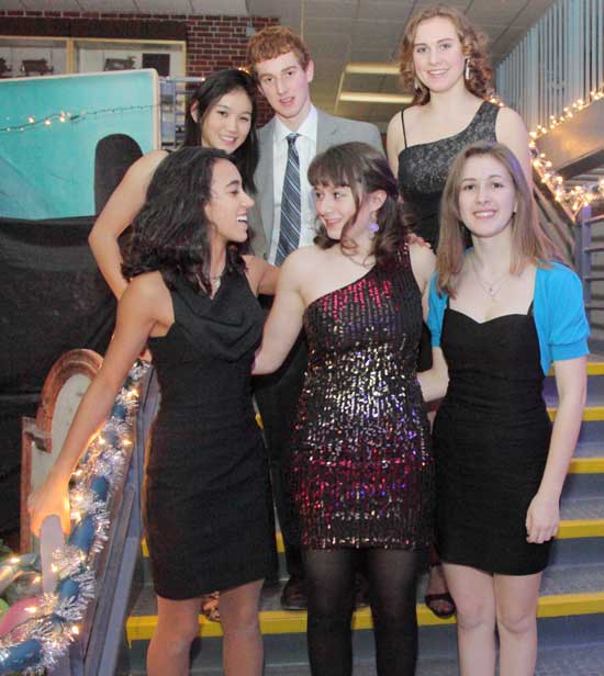After a long day of setup, a group of juniors poses after dressing up for the dance. Front row from left: Arpitha Hayes, Polly Lauer, and Janet Sorrells. Back row: Clara Wang, Drew Banker, and Alyssa Johnson. 