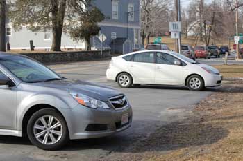 The parking area on Mass. Ave that is proposed to be torn up. (Photo by Lisa Aciukewicz)