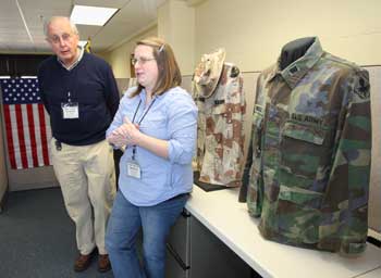 During a recent tour of the Devens Museum, President of the Board of Directors C. David Gordon and Executive Director Kara Fossey explain that Fort Devens was still active during Desert Storm, the first Gulf War. (Photo by Lisa Aciukewicz)