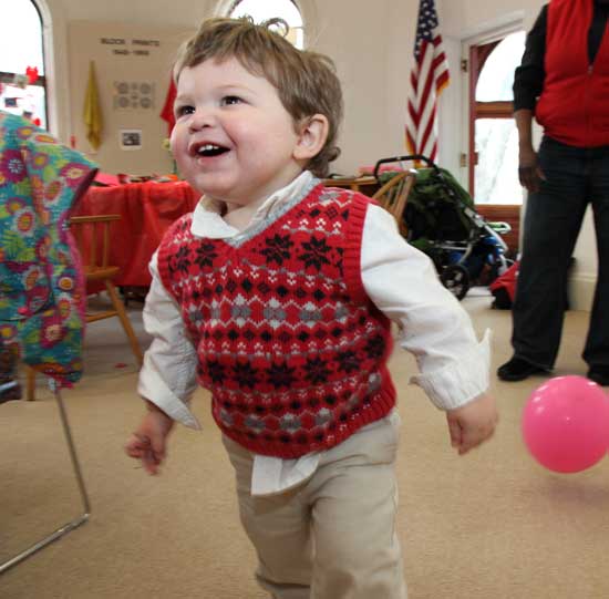 Tatum Burgess-Rehm drops his balloon and takes off on a run. 