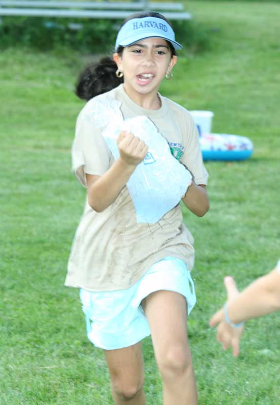 Marcelle Hazoury gives it all she’s got as she sprints toward the finish line.