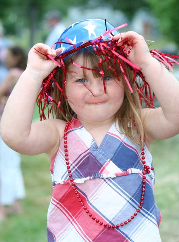 Natalia Dutkewych shows off her hat and a popsicle mustache.