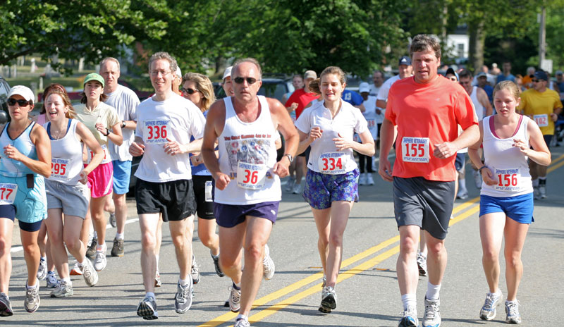 Runners compete in Harvard's 5-mile race on July 4. (Photo by Rob Williams)